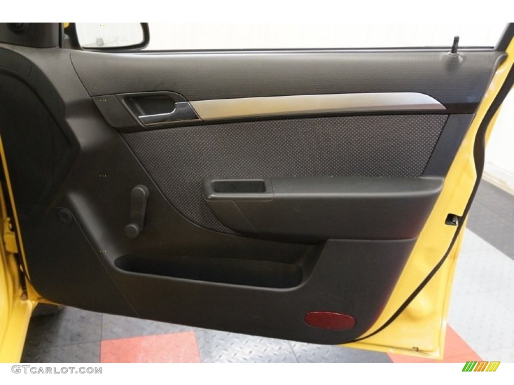 2010 Chevrolet Aveo LT Sedan Charcoal Door Panel Photo #98349513