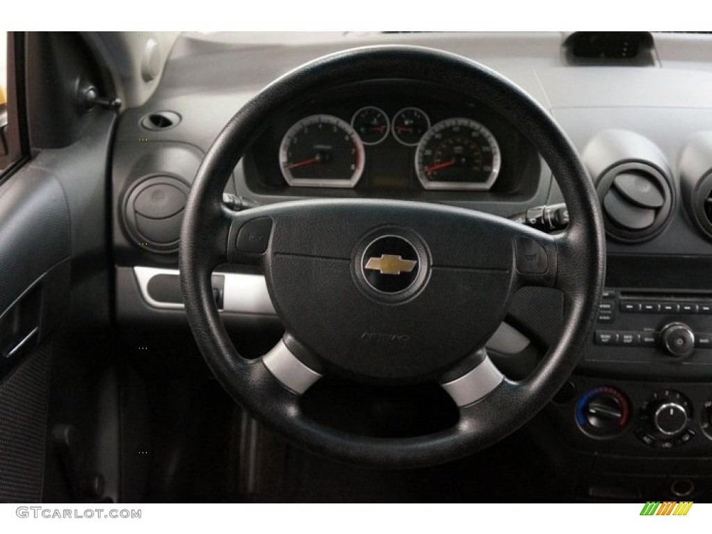2010 Chevrolet Aveo LT Sedan Charcoal Steering Wheel Photo #98349672