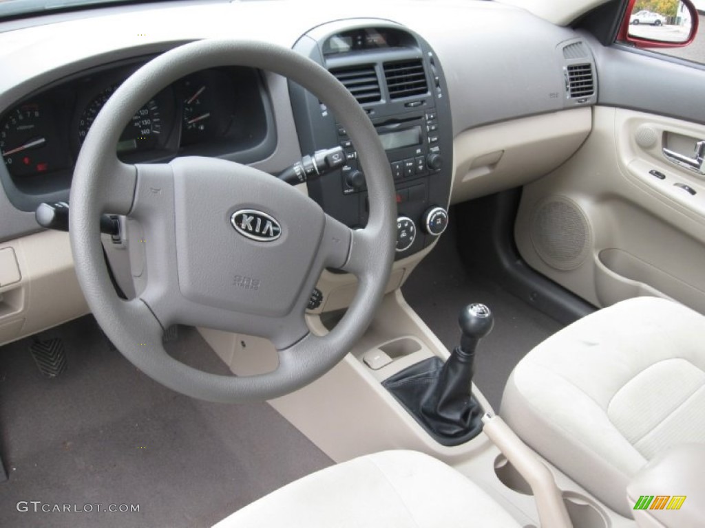2009 Spectra EX Sedan - Spicy Red Metallic / Beige photo #11