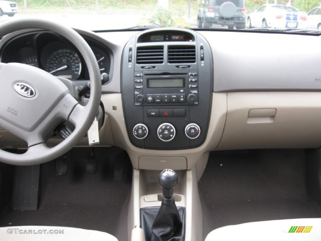 2009 Spectra EX Sedan - Spicy Red Metallic / Beige photo #12