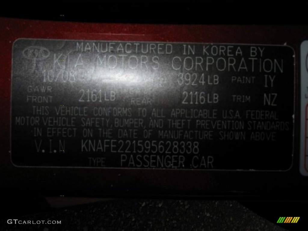 2009 Spectra EX Sedan - Spicy Red Metallic / Beige photo #15