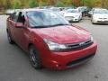 2010 Sangria Red Metallic Ford Focus SES Sedan  photo #1