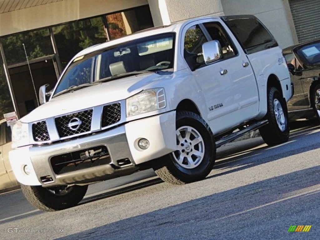 2006 Titan LE Crew Cab 4x4 - White / Graphite/Titanium photo #1