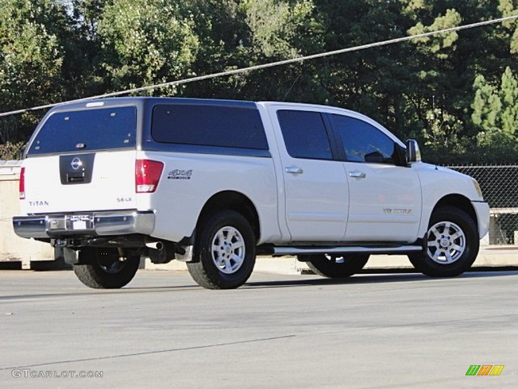 2006 Titan LE Crew Cab 4x4 - White / Graphite/Titanium photo #2