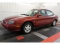 1999 Toreador Red Metallic Ford Taurus SE  photo #2