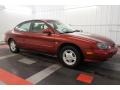 1999 Toreador Red Metallic Ford Taurus SE  photo #6