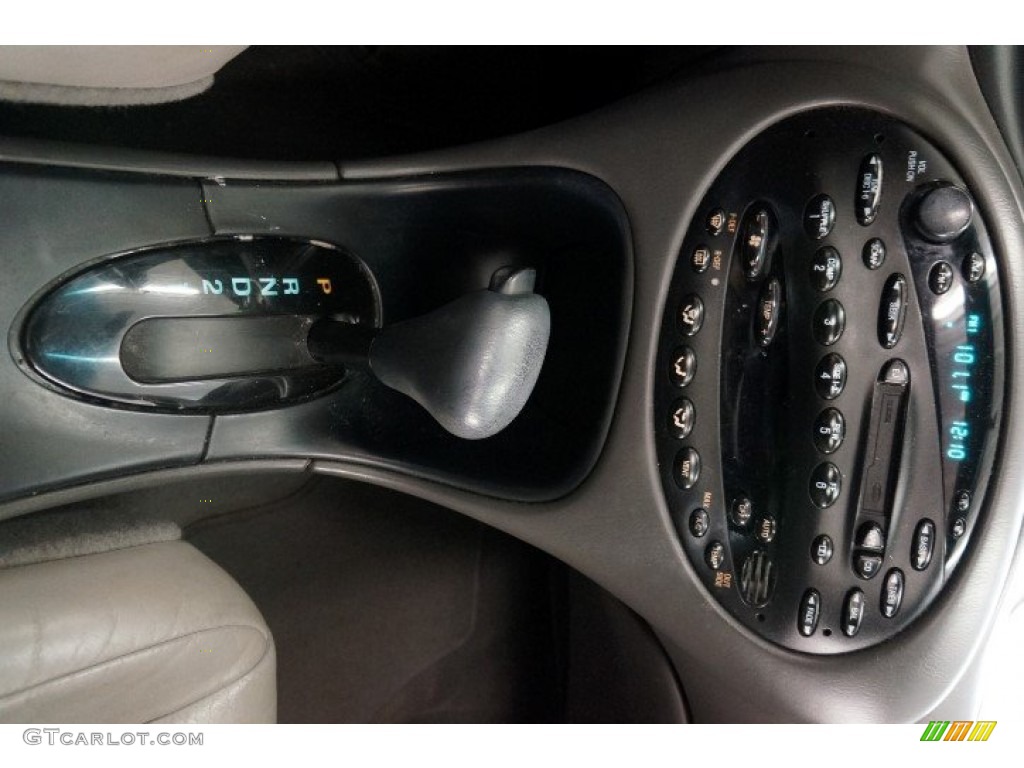 1999 Taurus SE - Toreador Red Metallic / Medium Graphite photo #27