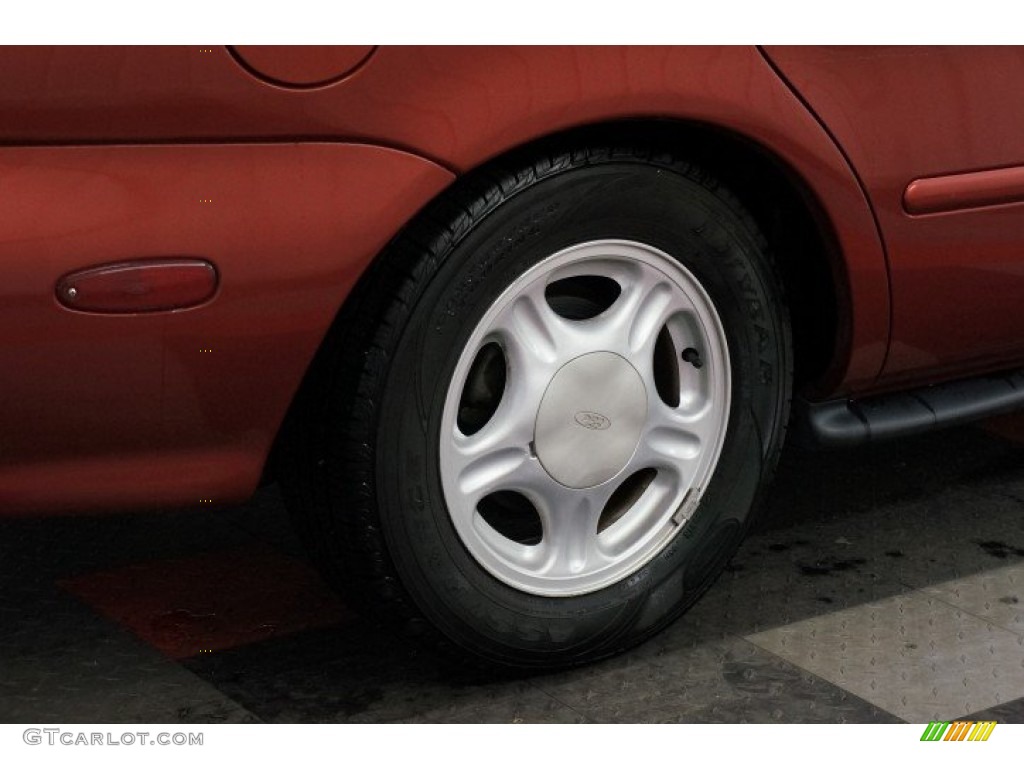 1999 Taurus SE - Toreador Red Metallic / Medium Graphite photo #46