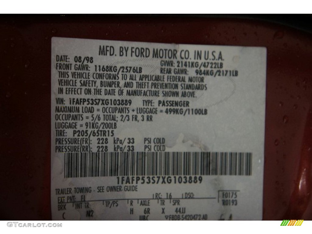 1999 Taurus SE - Toreador Red Metallic / Medium Graphite photo #62