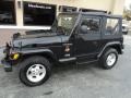 Black 1999 Jeep Wrangler Sahara 4x4