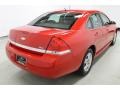 2010 Victory Red Chevrolet Impala LS  photo #12