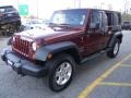 Red Rock Crystal Pearl 2010 Jeep Wrangler Unlimited Sport 4x4