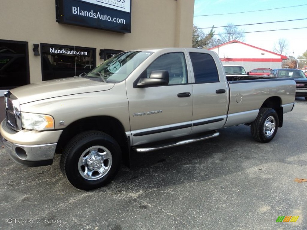 2004 Ram 2500 SLT Quad Cab 4x4 - Light Almond Pearl Metallic / Taupe photo #1