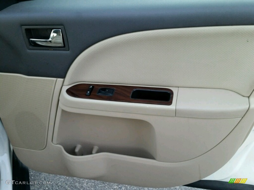 2009 Ford Taurus SEL Camel Door Panel Photo #99026475