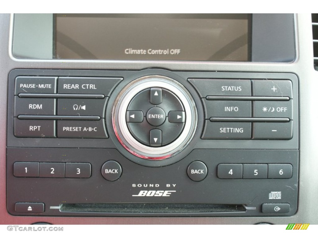 2010 Armada Titanium - Tuscan Sun Red Pearl / Charcoal photo #36