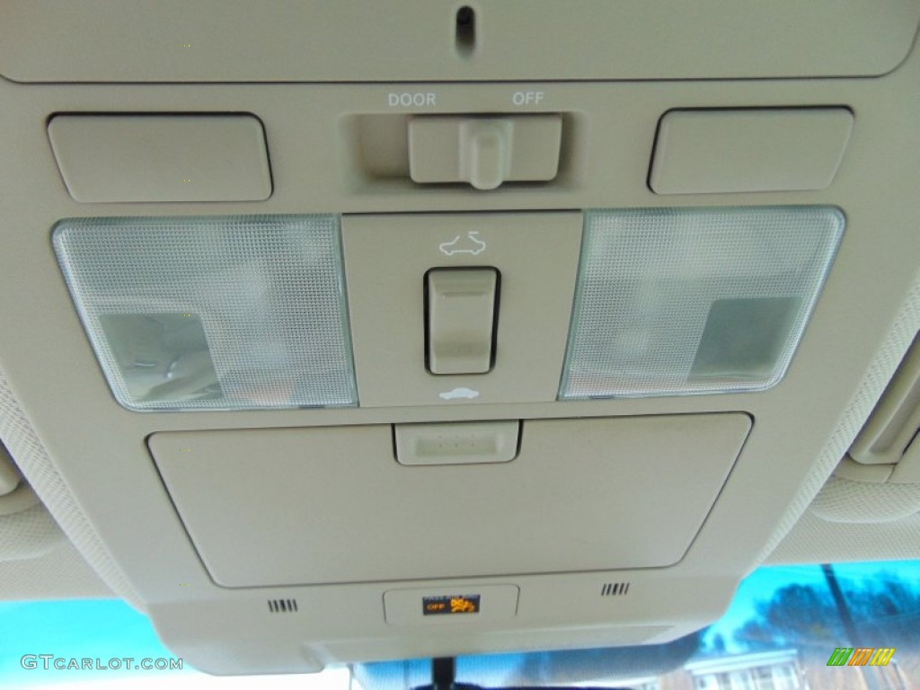 2006 M 35x Sedan - Liquid Platinum Metallic / Wheat photo #27
