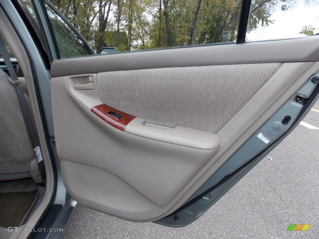 2004 Toyota Corolla LE Pebble Beige Door Panel Photo #99164740