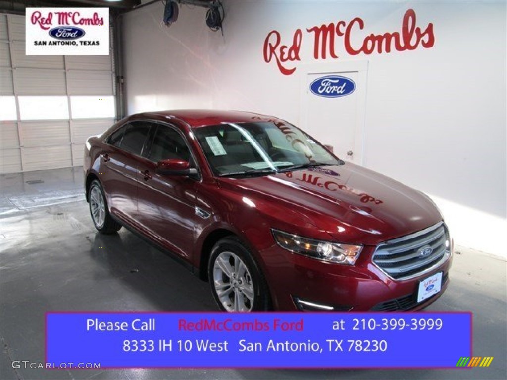 2015 Taurus SEL - Ruby Red Metallic / Dune photo #1