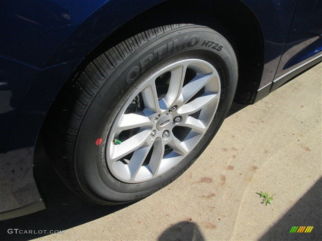 2015 Taurus SE - Deep Impact Blue Metallic / Dune photo #26