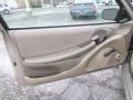 Taupe 2002 Pontiac Sunfire SE Coupe Door Panel