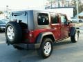 2010 Red Rock Crystal Pearl Jeep Wrangler Unlimited Rubicon 4x4  photo #14