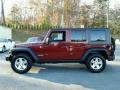 2010 Red Rock Crystal Pearl Jeep Wrangler Unlimited Rubicon 4x4  photo #18