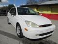 2003 Cloud 9 White Ford Focus LX Sedan  photo #1