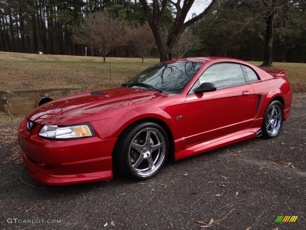 Laser Red Metallic 2000 Ford Mustang GT Coupe Exterior Photo #99620355