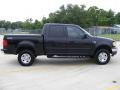 2001 Black Ford F150 XLT SuperCrew 4x4  photo #2