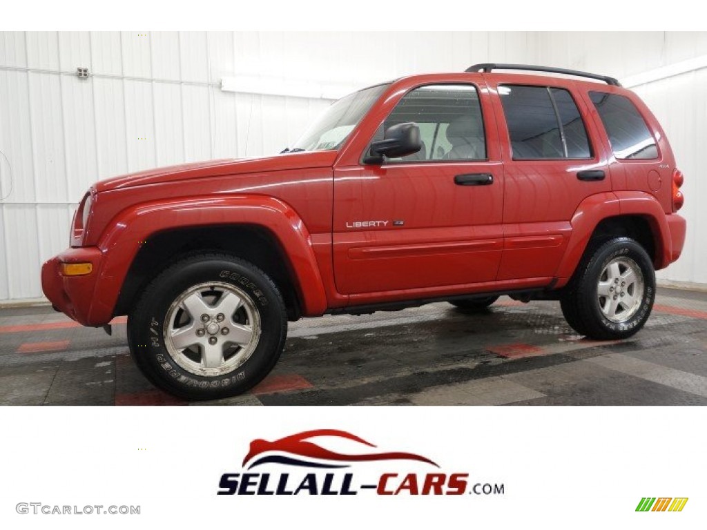 2002 Liberty Limited 4x4 - Flame Red / Taupe photo #1