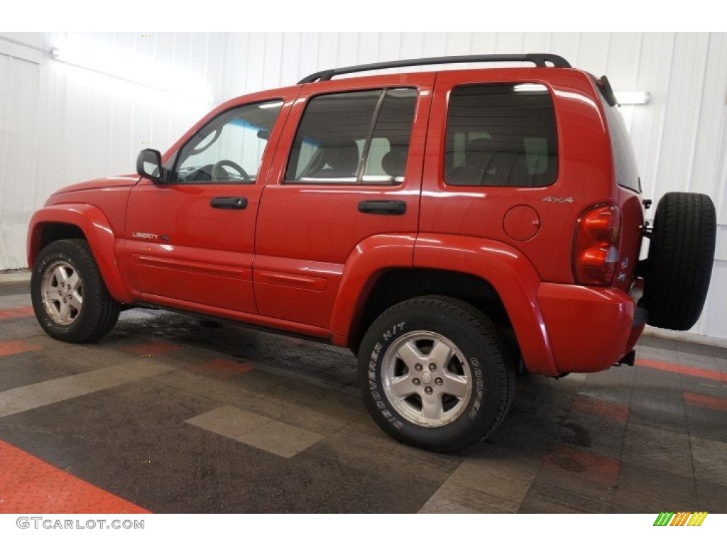 2002 Liberty Limited 4x4 - Flame Red / Taupe photo #16