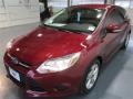 2014 Ruby Red Ford Focus SE Hatchback  photo #3